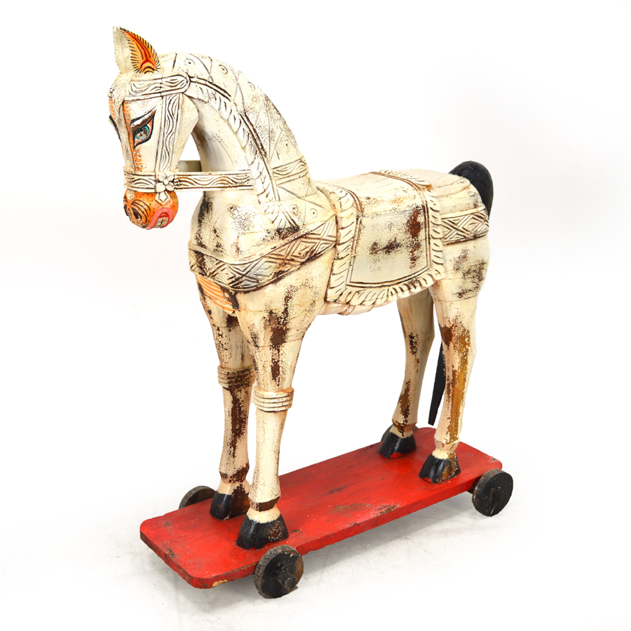 vintage wooden horse on wheels